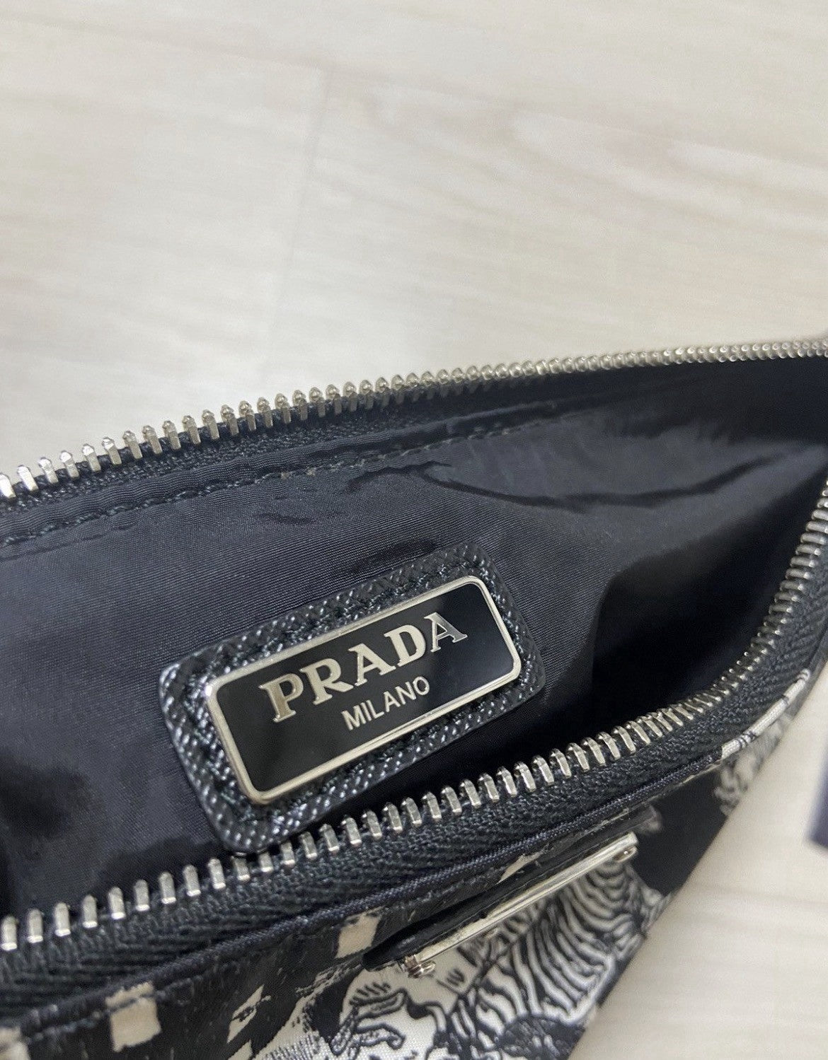 OS Prada ‘SURVIVAL UTOPIA’ CHRISTOPHE CHEMIN Clutch bag