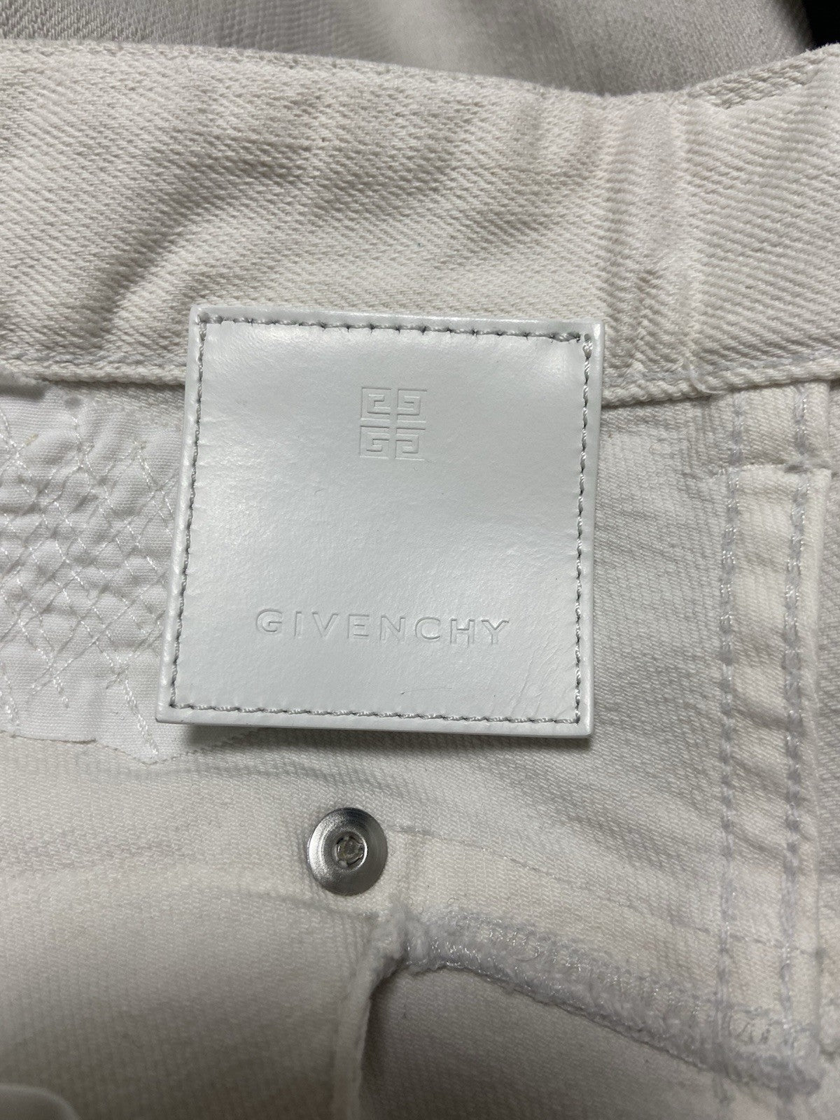 31 Givenchy ss23 distressed vintage effect denim pants