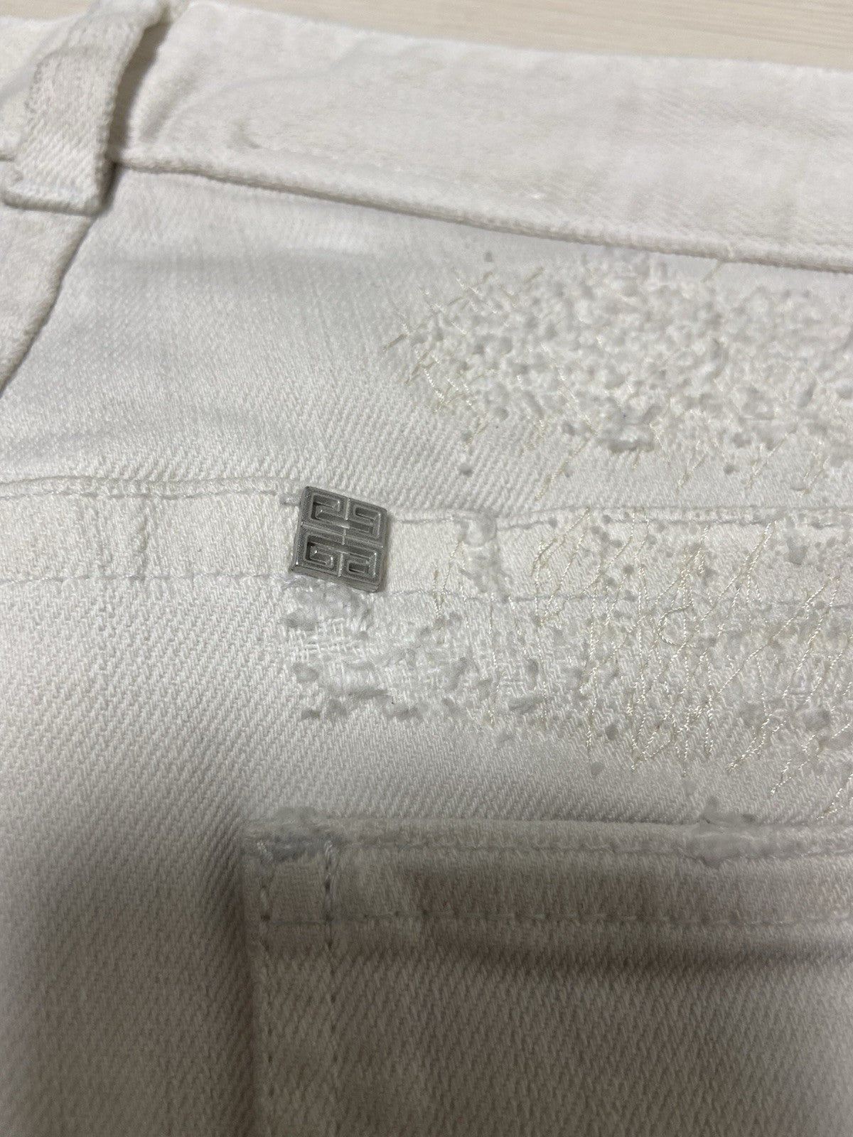 31 Givenchy ss23 distressed vintage effect denim pants