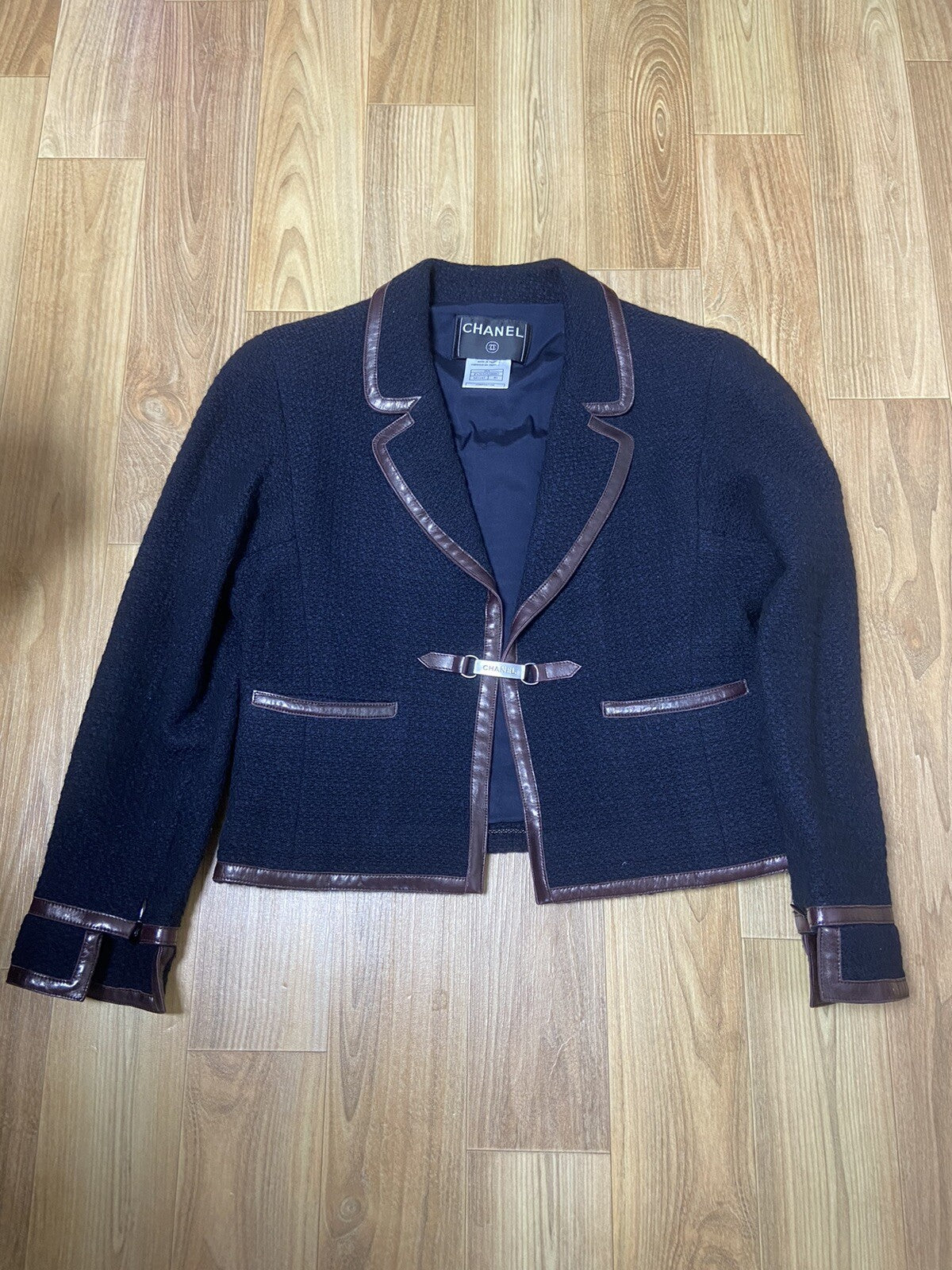 40 Chanel logo buckle leather trimmed wool tweed jacket