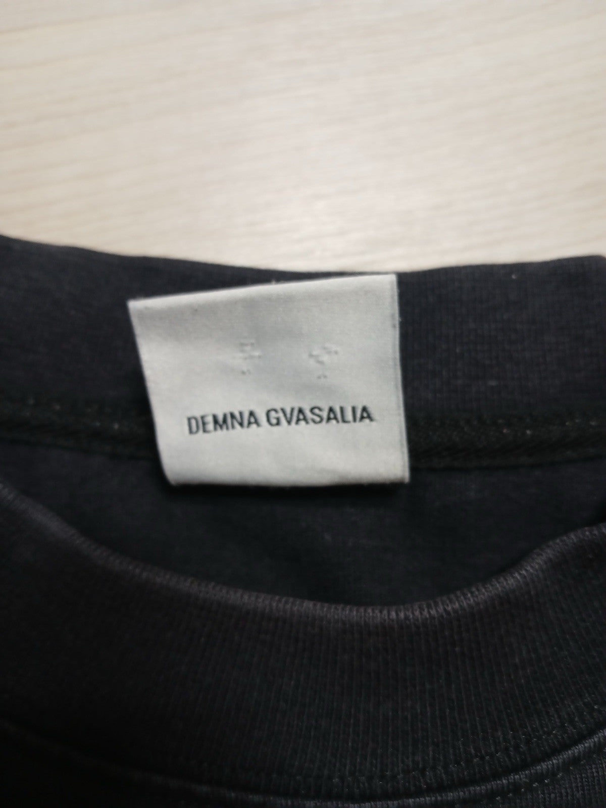 Xs vetements gmbh metal logo oversized long sleeve shirt